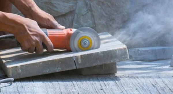 Cut concrete slab with angle grinder
